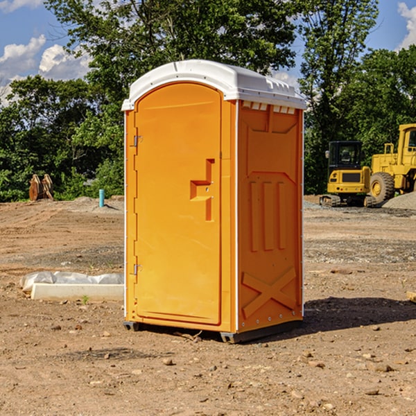 what is the cost difference between standard and deluxe portable restroom rentals in Cooksburg